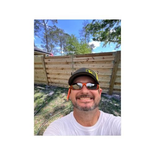 Tommy of 4 Tradesmen Fencing at a fence project