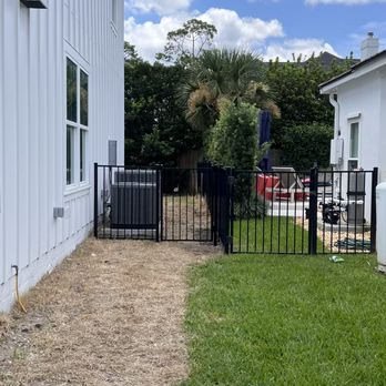 Black aluminum fence and gate installed in Ponte Vedra by 4 Tradesmen Fencing