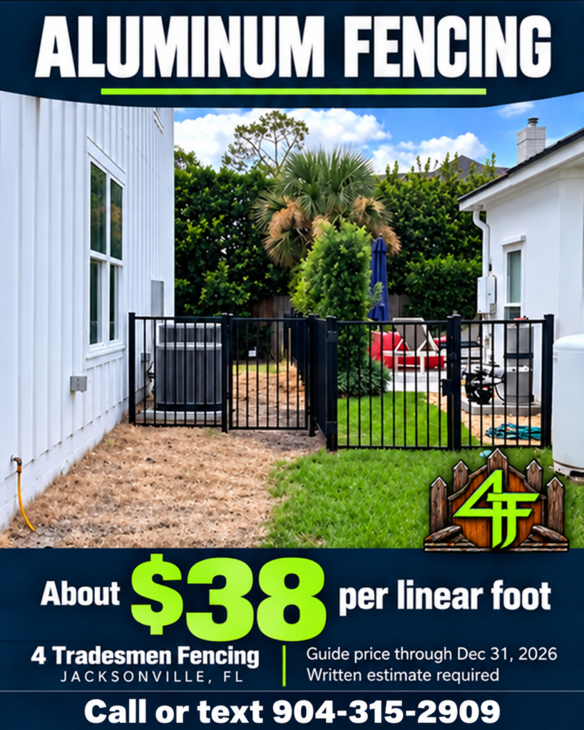 Black aluminum picket fence and gates along a side yard on a 4 Tradesmen Fencing project in Northeast Florida; about $38 per linear foot guide price.