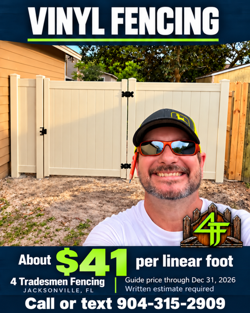 Vinyl privacy fence with matching gate and dark hardware in a 4 Tradesmen Fencing project; about $41 per linear foot in the Jacksonville service area.